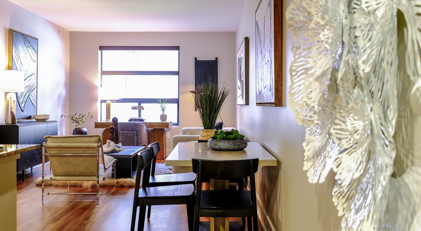Spacious living areas to recline and recharge a dining room with a table and chairs