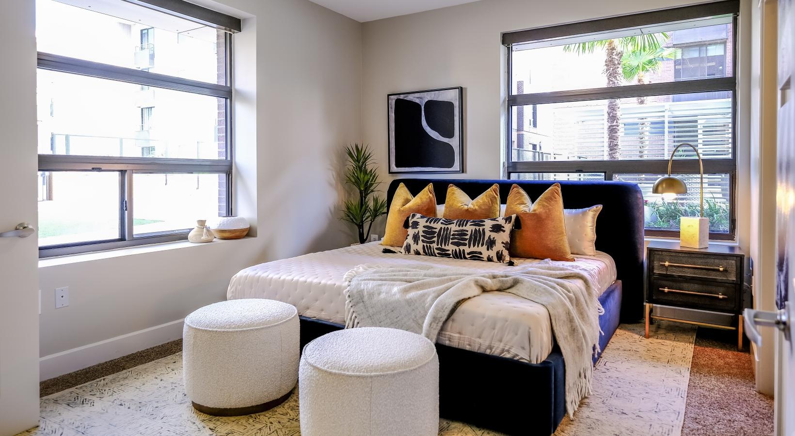 Sleep in style a bedroom with a large bed and a tv