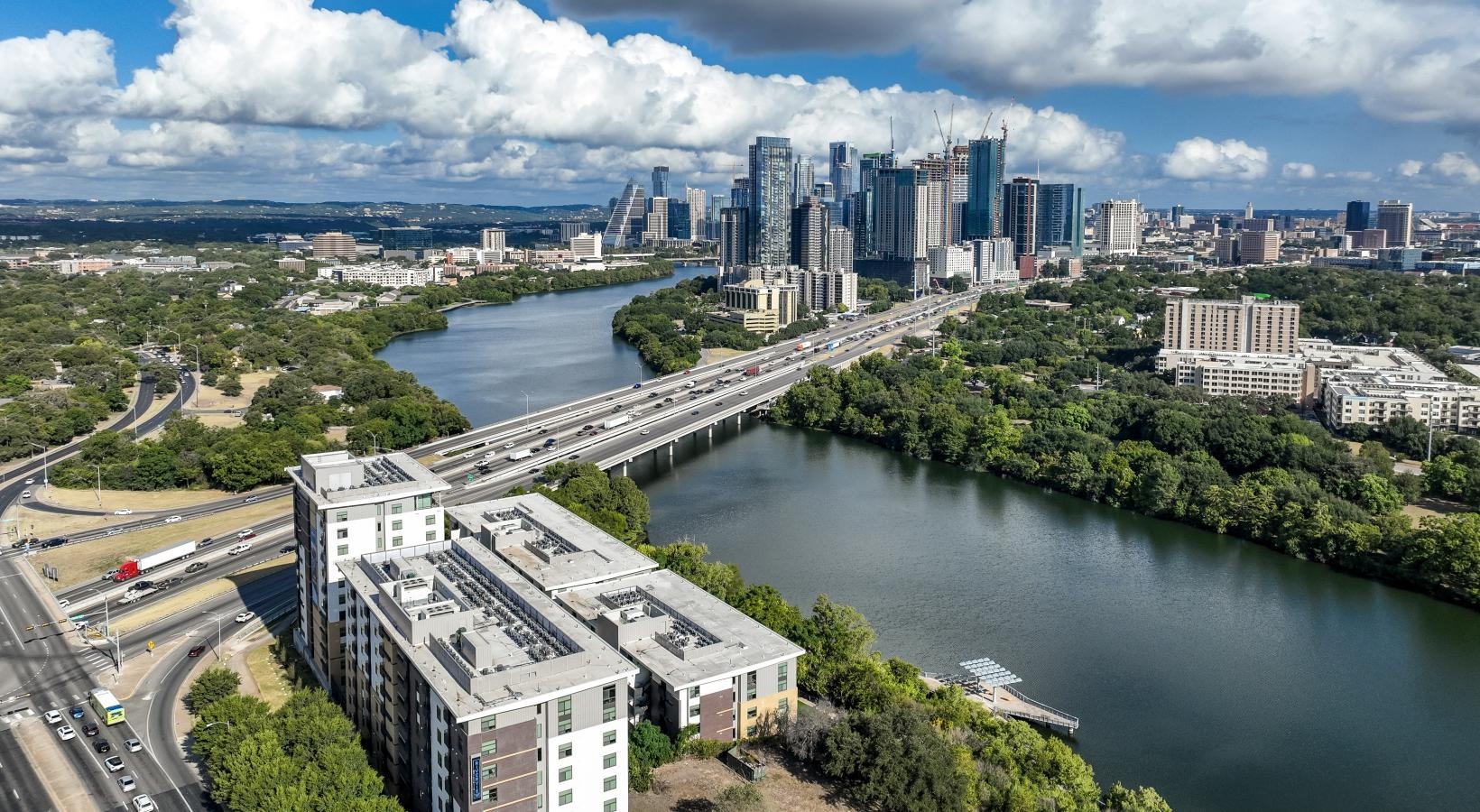 The essence of exceptional living a river with a city in the background