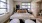 a bedroom with a large window