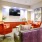 a living room with a tv and couches