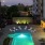 a pool in a courtyard between buildings