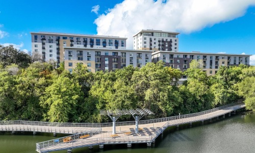 a building with a bridge over a river