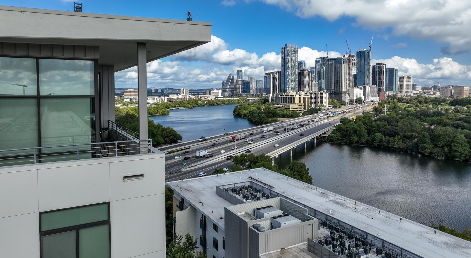 Settle into comfort at Berkshire Riverview a view of a city from a high rise building
