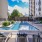 a pool with chairs around it