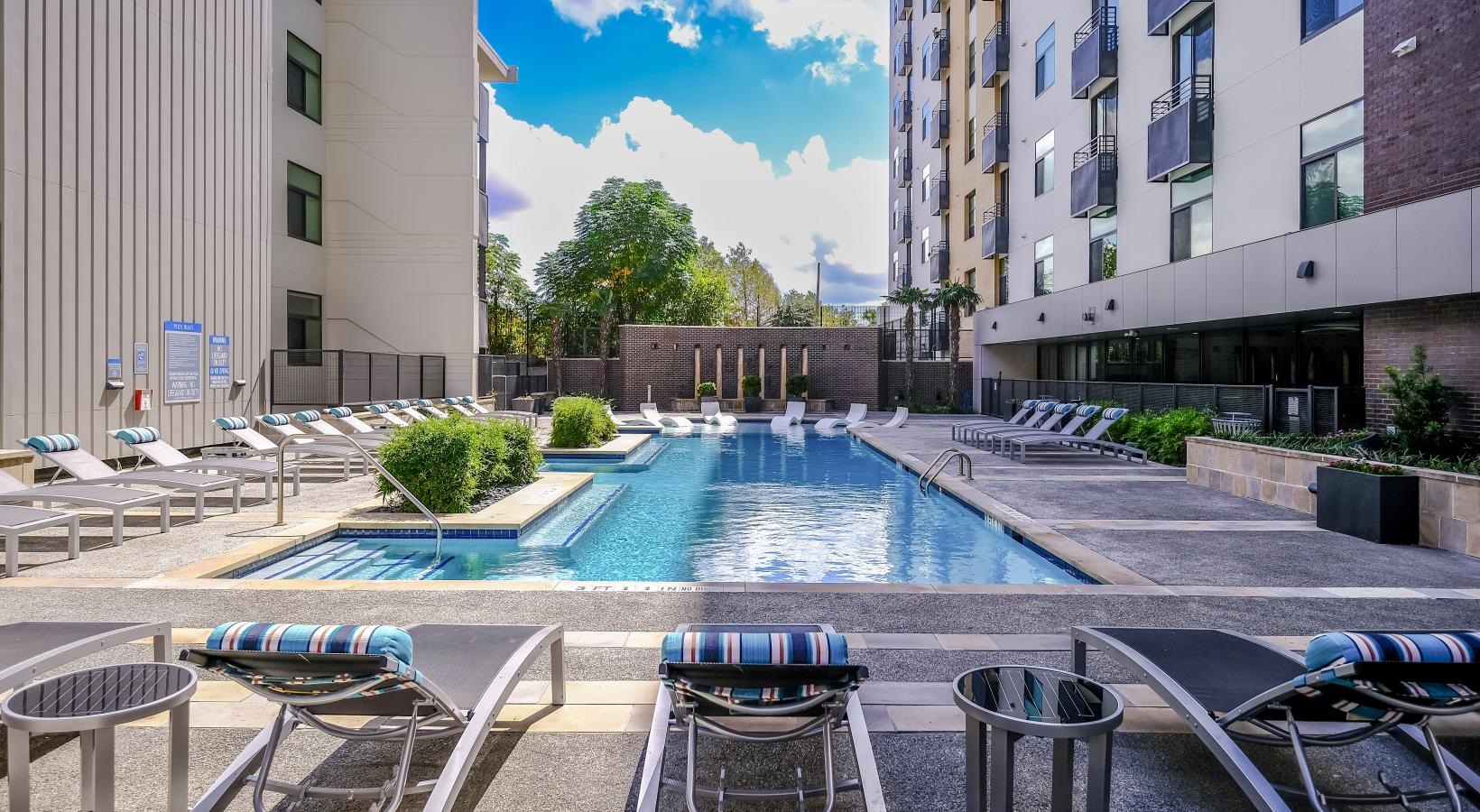 Find your perfect fit at Berkshire Riverview a pool with chairs around it
