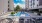 a pool with chairs around it
