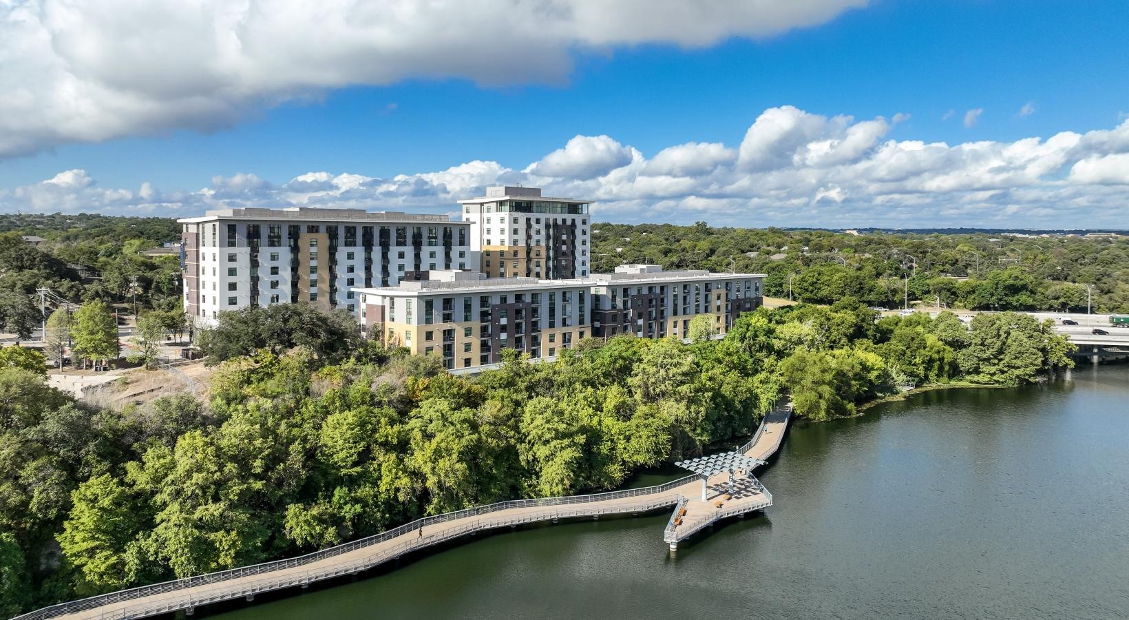 Find your perfect fit at Berkshire Riverview a river with a bridge and buildings along it