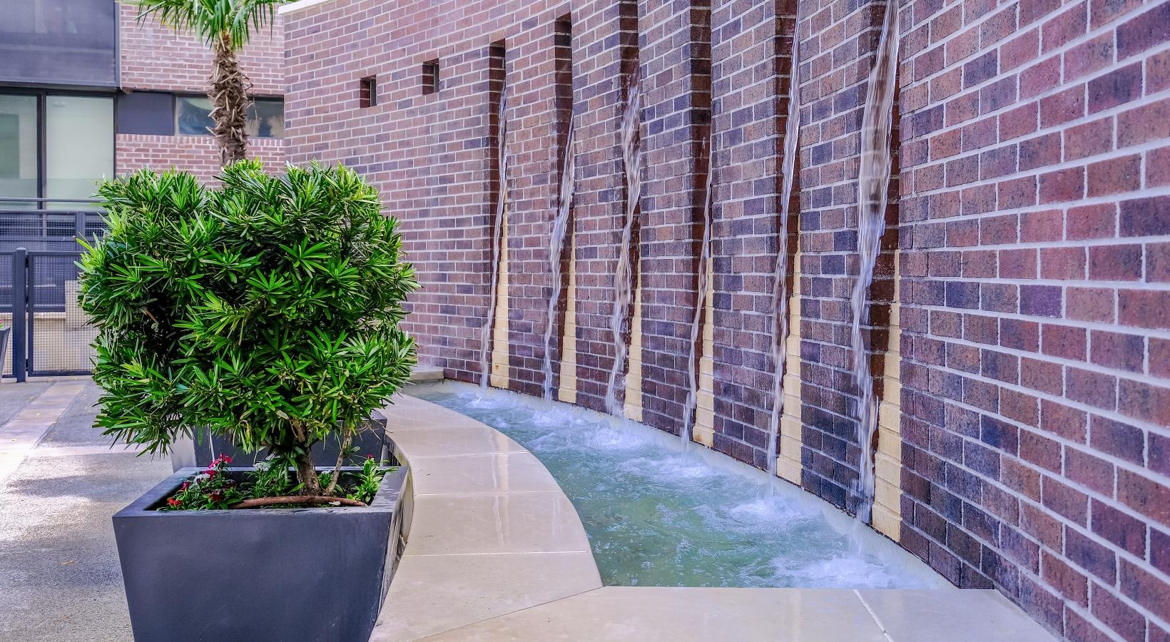 The essence of exceptional living a pool in a brick building