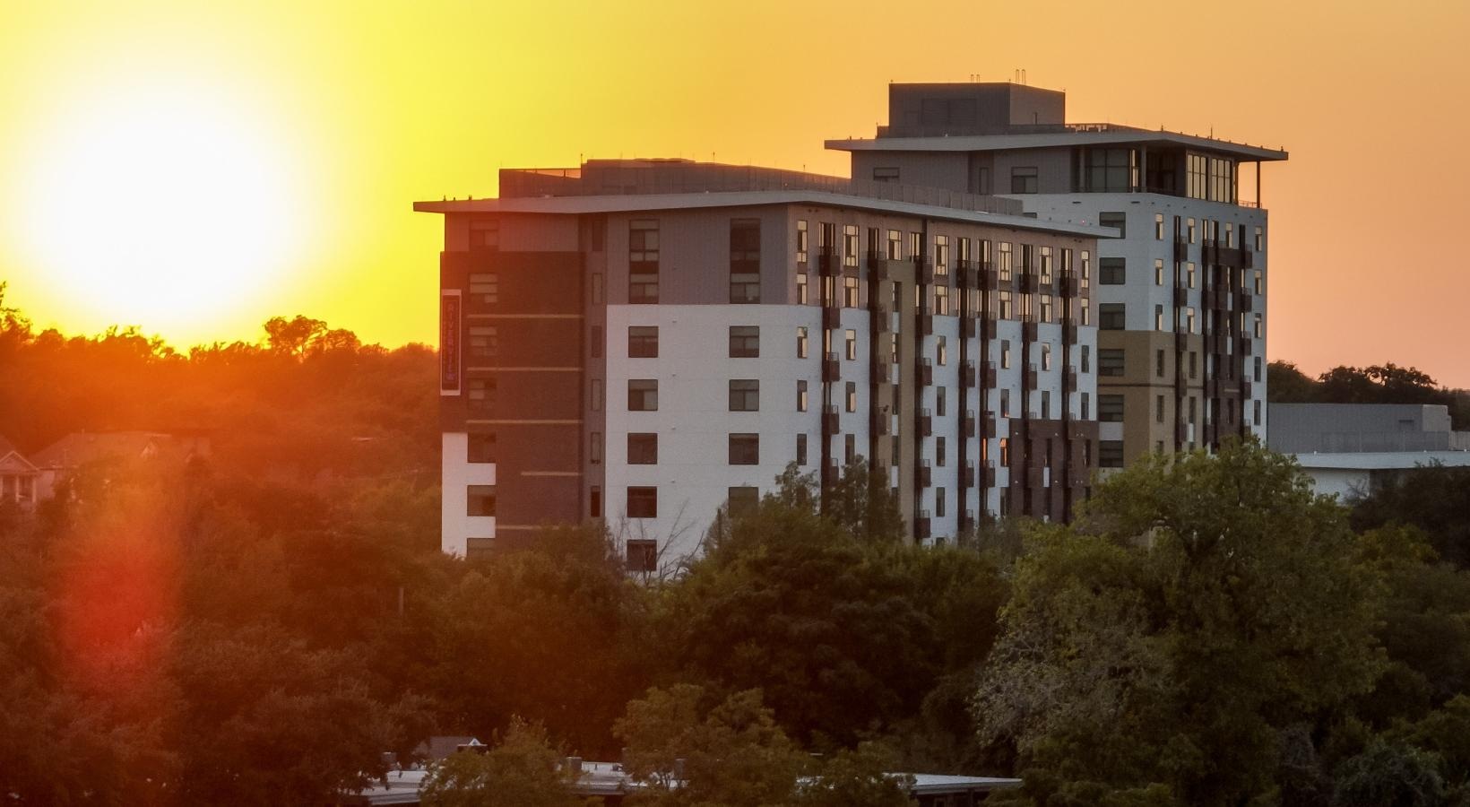 Settle into comfort at Berkshire Riverview a building with trees in front of it