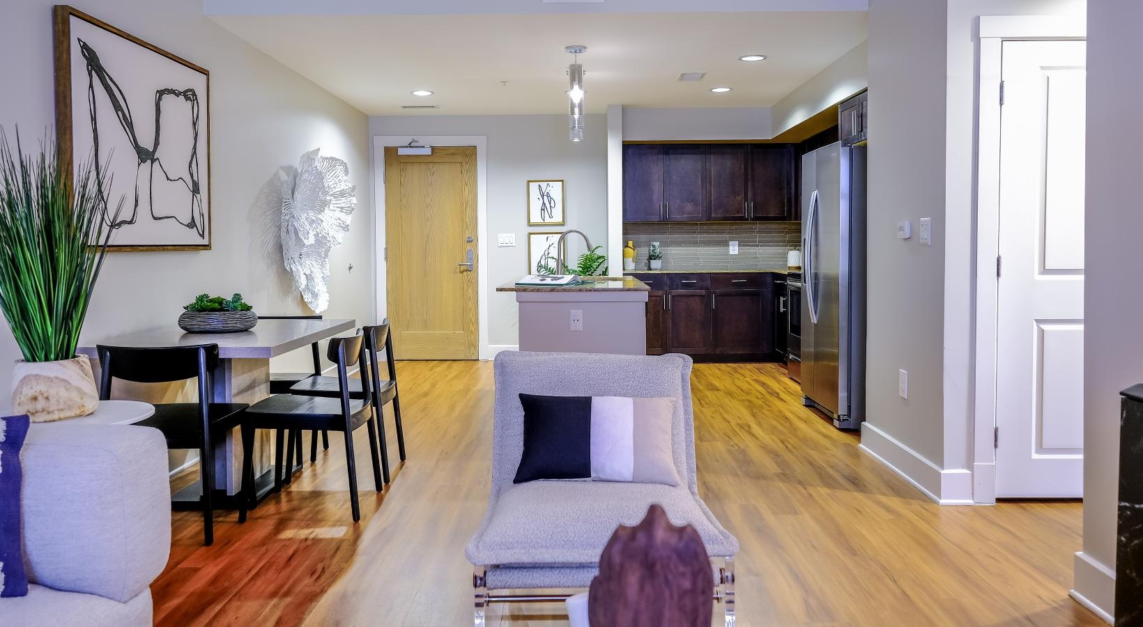 Spacious living areas to recline and recharge a living room with a wood floor