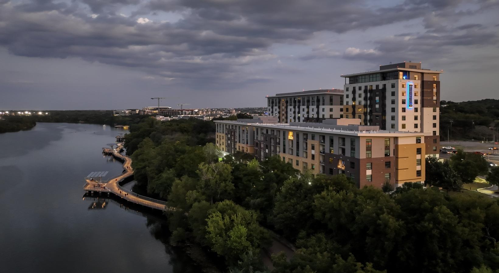 Settle into comfort at Berkshire Riverview a building on a hill by a river