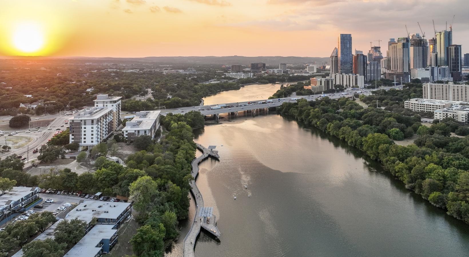 Settle into comfort at Berkshire Riverview a river with a city in the background